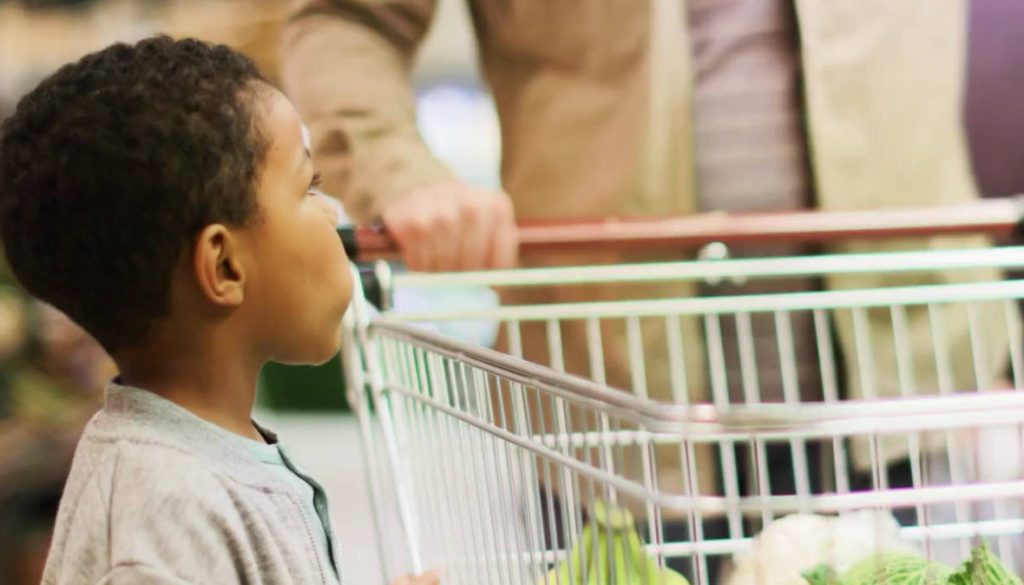 father-and-son-buying-fruit-and-vegetable