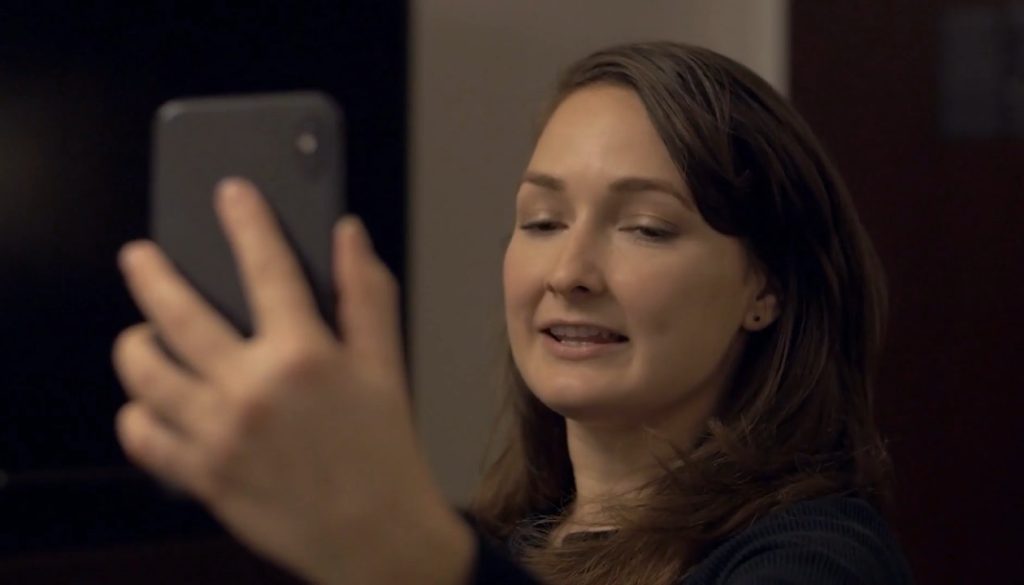 woman-using-phone-to-facetime2-flipped